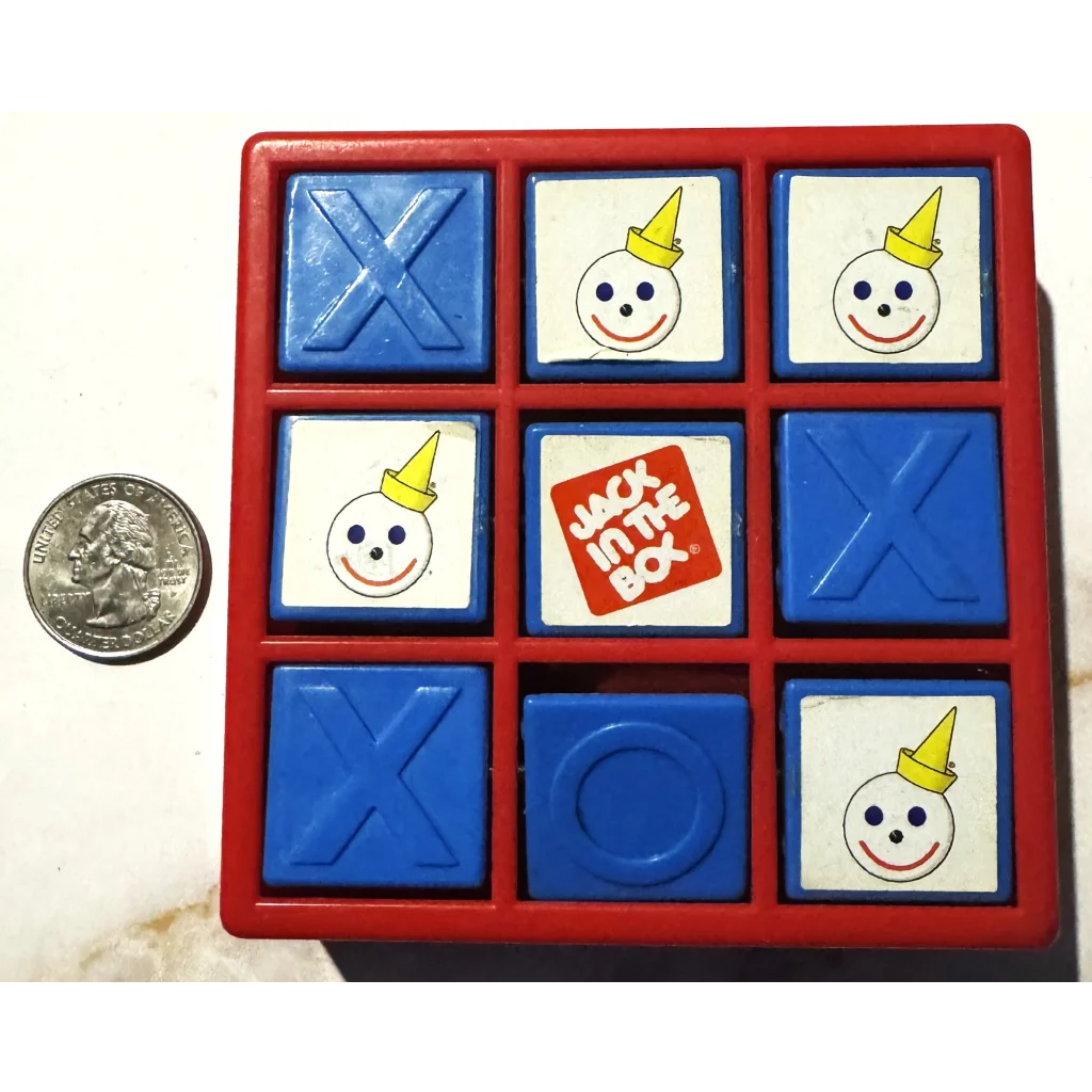 Red Jack in the Box Tic Tac Toe game board with blue X markers for fun play