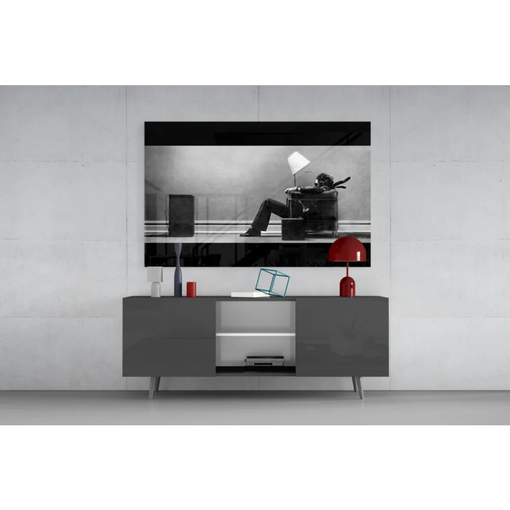 Sleek gray console table under striking black and white wall art