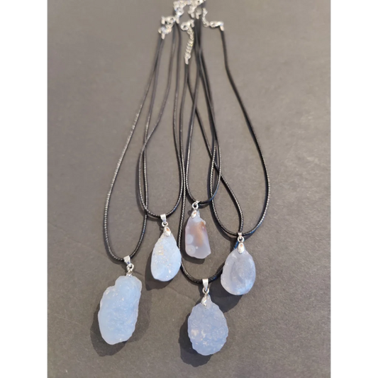 Set of five Gobi Desert blue chalcedony raw stone pendant necklaces