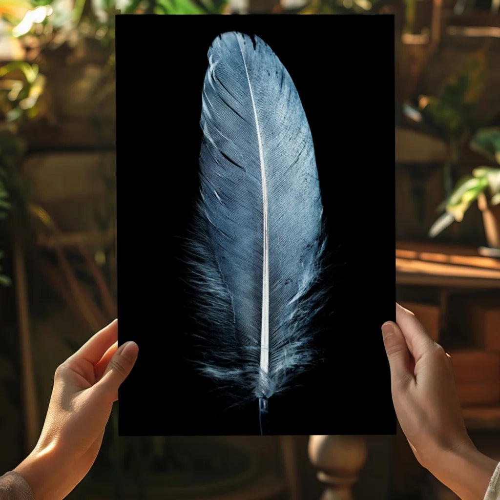 Stunning blue feather insigne aluminum print on black canvas held by hands