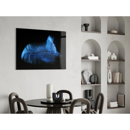 Glowing blue feather glass wall art on black canvas