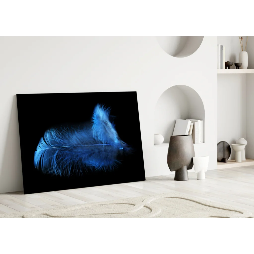 Glowing blue feather glass wall art on black canvas print