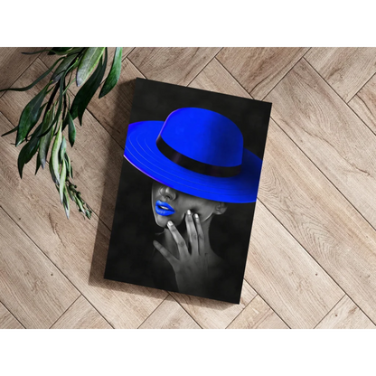 Blue fedora hat with black and white face design on canvas print