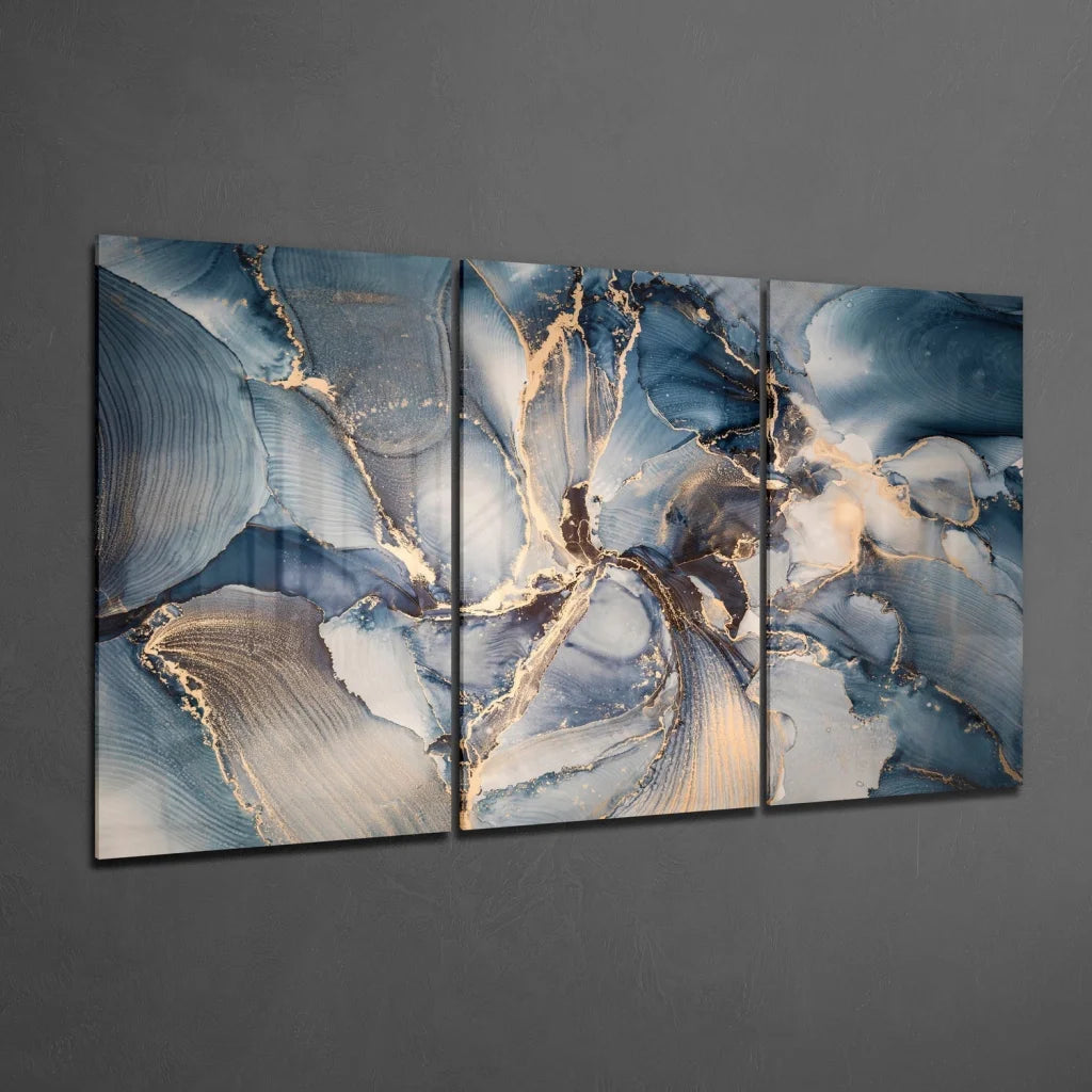 Stunning blue gold swirled glass wall art triptych with marbled patterns