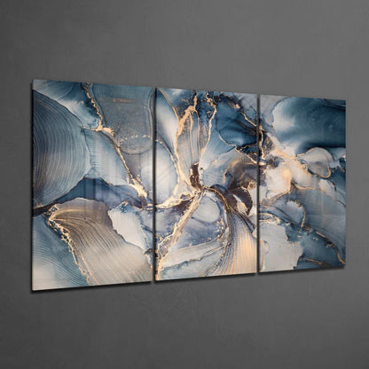 Stunning blue gold swirled glass wall art triptych with marbled patterns