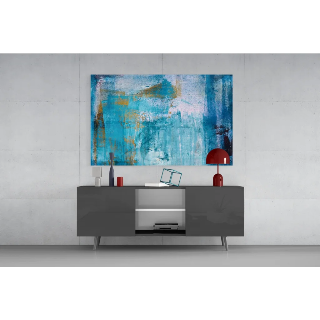Vibrant teal and gold abstract wall art canvas with turquoise, gold, and deep blue strokes above gray console table