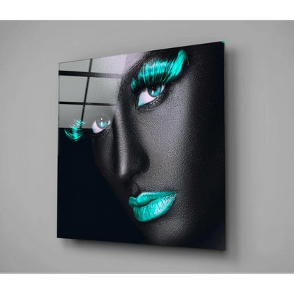 Stunning teal portrait glass wall art of woman with vibrant lashes