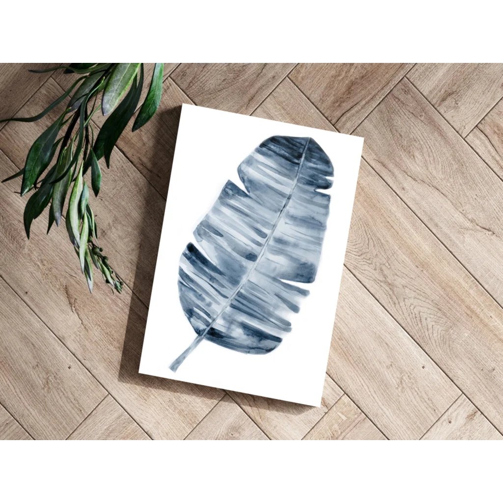 Blue leaf print on white canvas aluminum art with tropical vibes