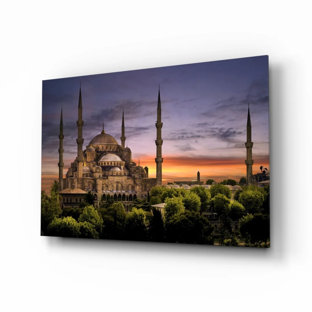 Blue Mosque sunset glass wall art print with vibrant sky silhouette
