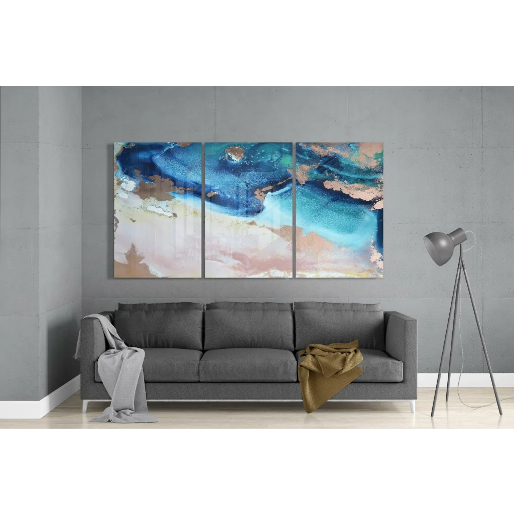 Stunning three-panel glass wall art with swirling blues, teals, peach, and gold accents