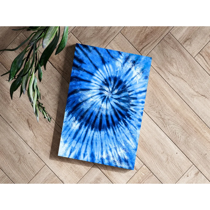 Vibrant blue spiral tie-dye pattern on aluminum canvas print