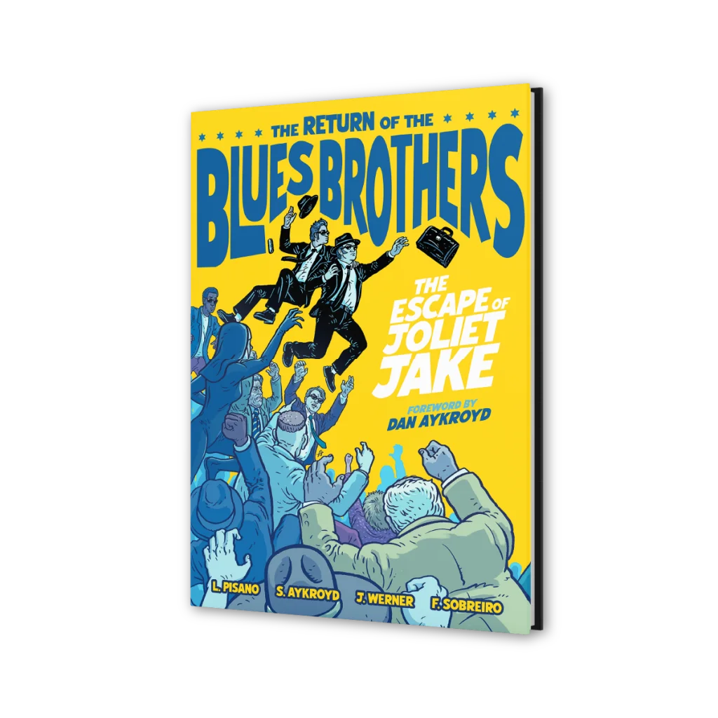 Blues Brothers Joliet Jake Standard Edition graphic novel with vibrant yellow cover and cartoon figures