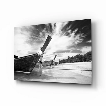Black and white longtail boats beach wall art canvas print
