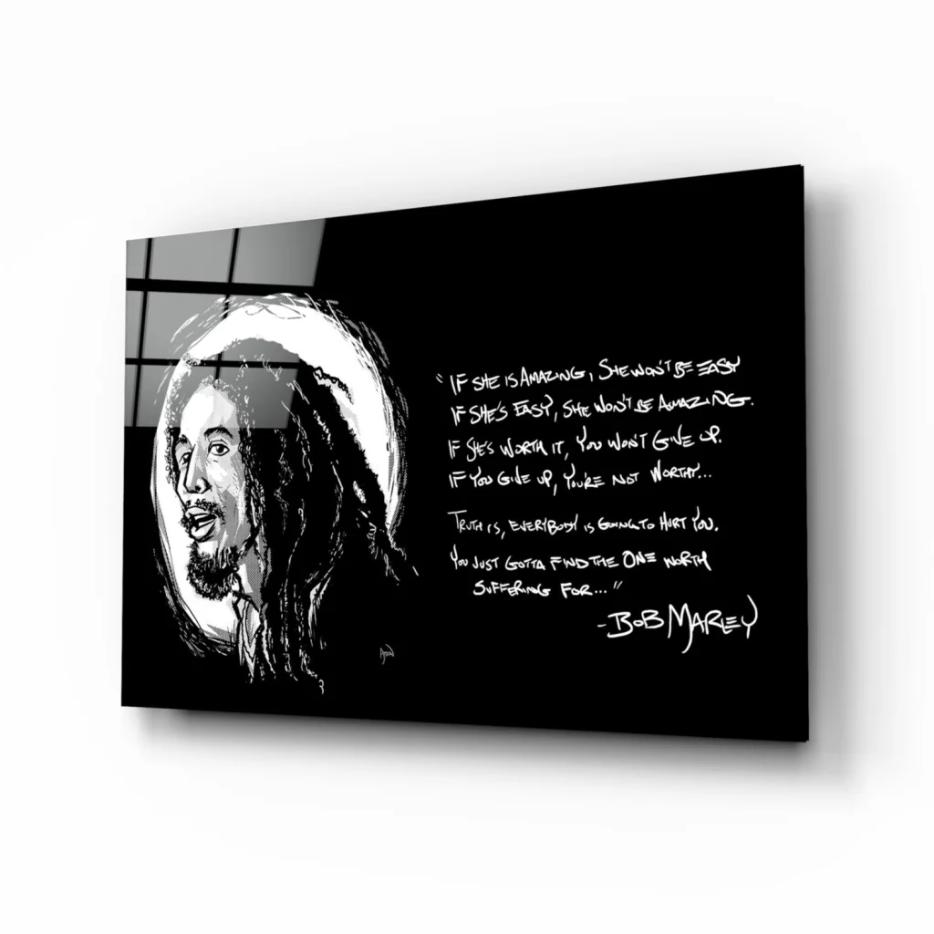Black and white Bob Marley portrait wall art with gold outline