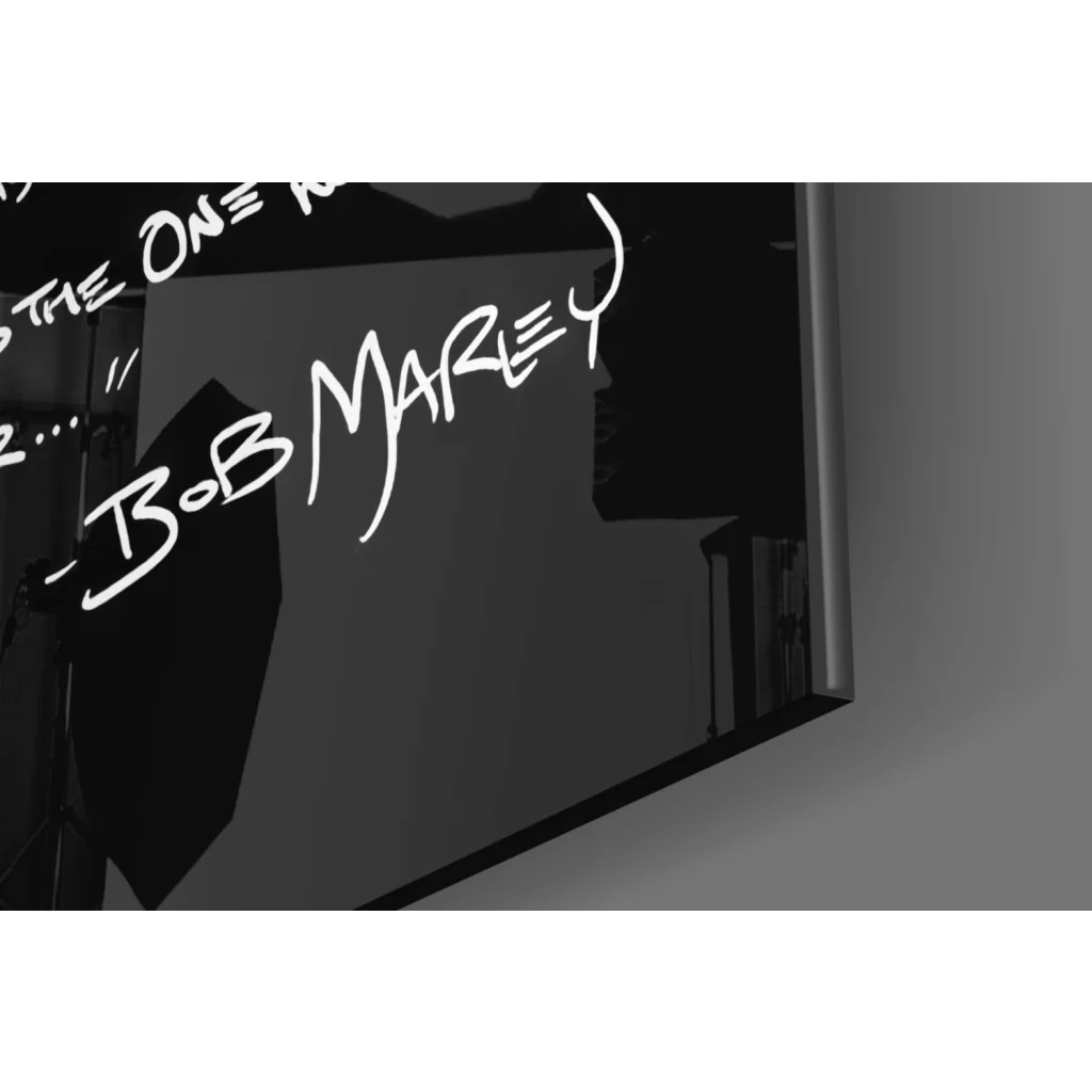 Illuminated Bob Marley neon sign in white on black, wall art portrait