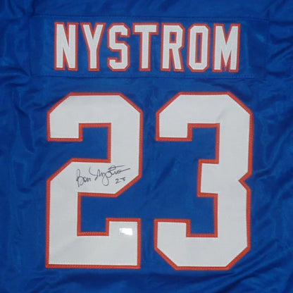 Bobby Nystrom autographed custom hockey jersey with blue design and number 23