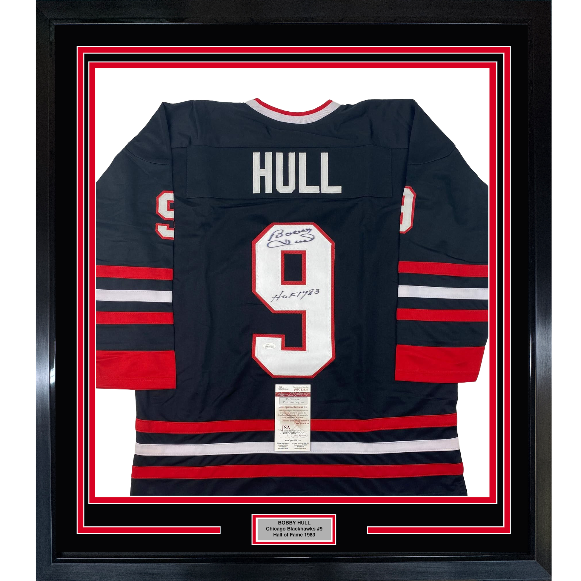 Framed Chicago Blackhawks jersey number 9 with "HULL" nameplate, navy with red and white stripes, displaying autograph and JSA authentication certificate.