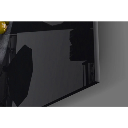 Black and gold abstract face wall art with bold umbrella design