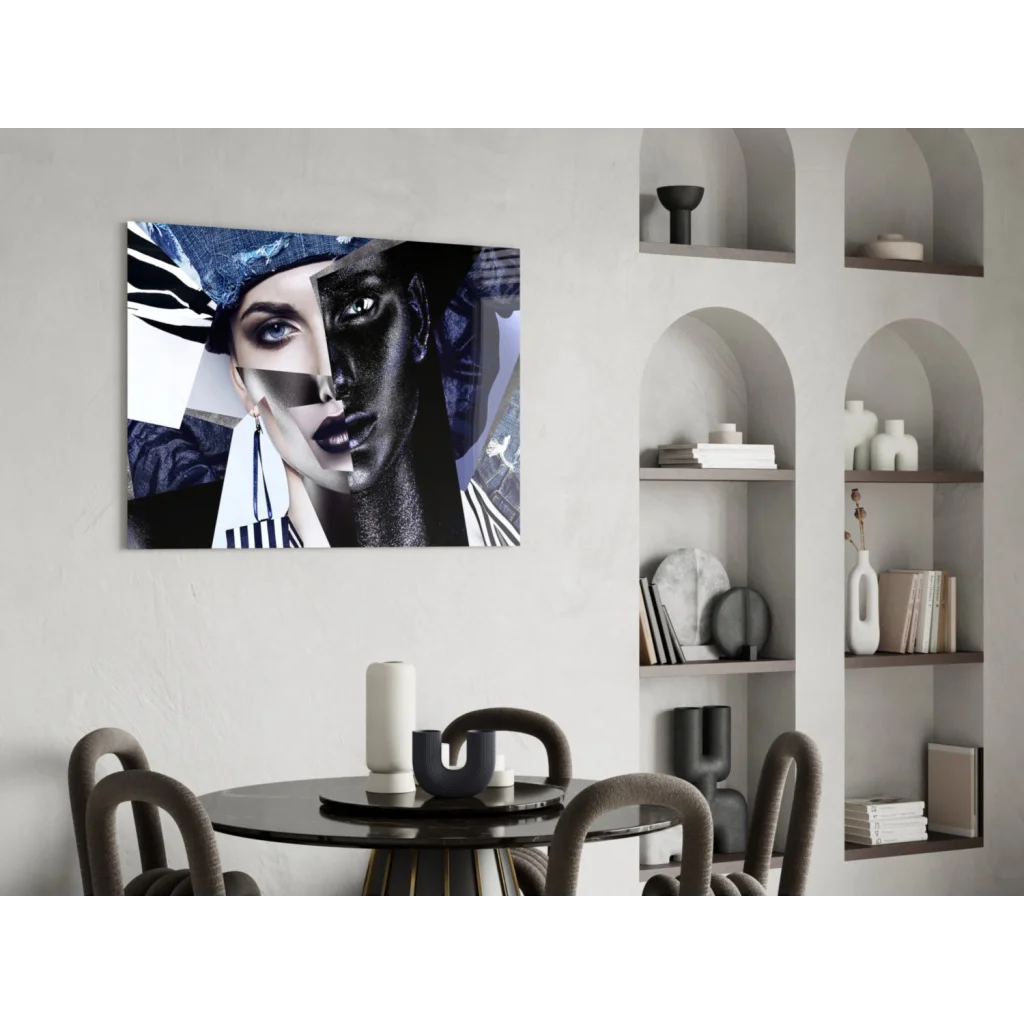 Bold black-and-white abstract portrait canvas of womans face with blue eyes, wall art on white wall