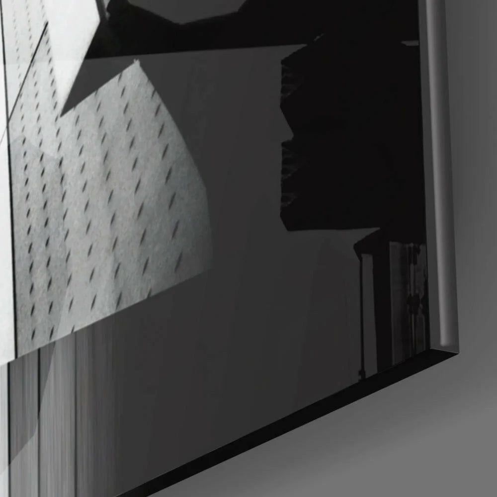 Bold black rectangular shower head with chrome accents in modern glass wall art