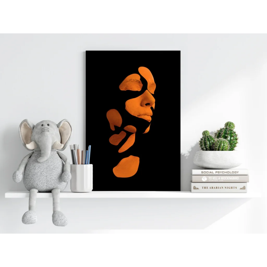 Bold orange abstract face art print on sleek black aluminum
