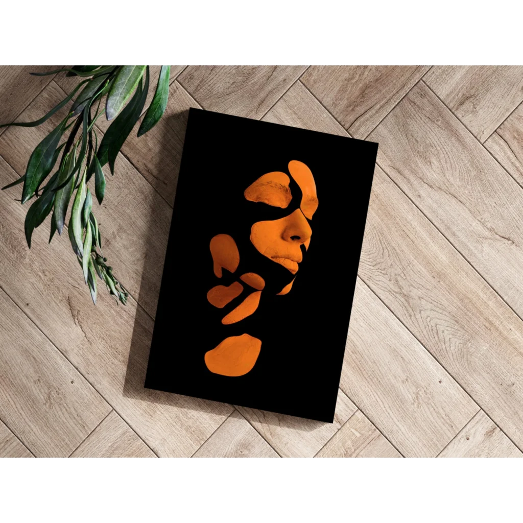 Bold orange abstract face on sleek black aluminum print