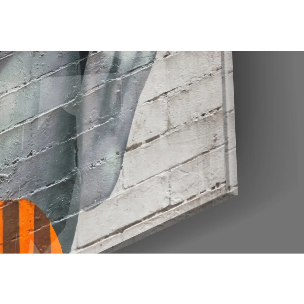 Bold gray and white brick wall art with orange geometric pop face pattern