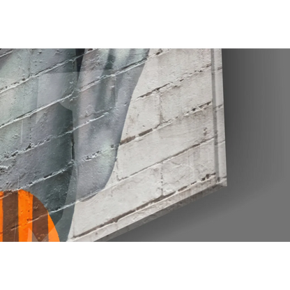 Bold gray and white brick wall art with orange geometric pop face pattern
