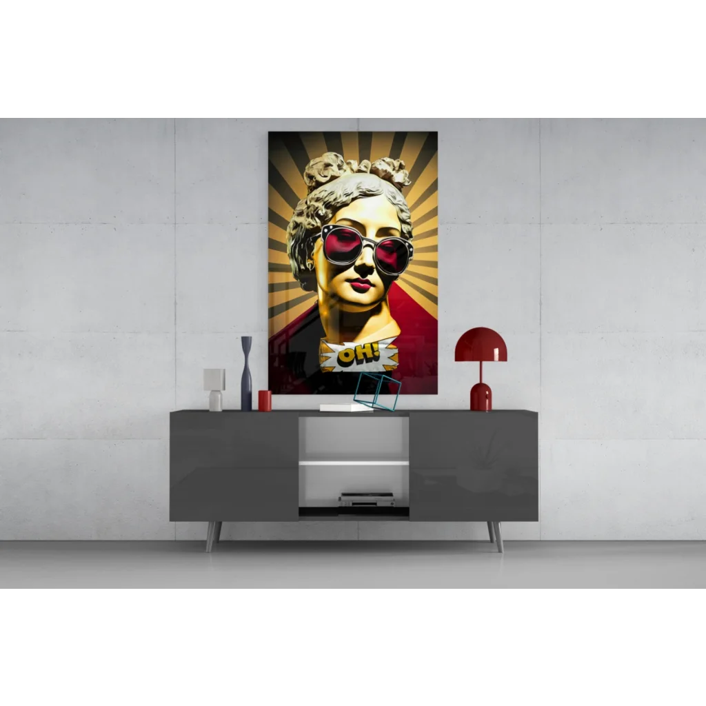 Bold gold statue of Marilyn Monroe in red sunglasses on glass wall art