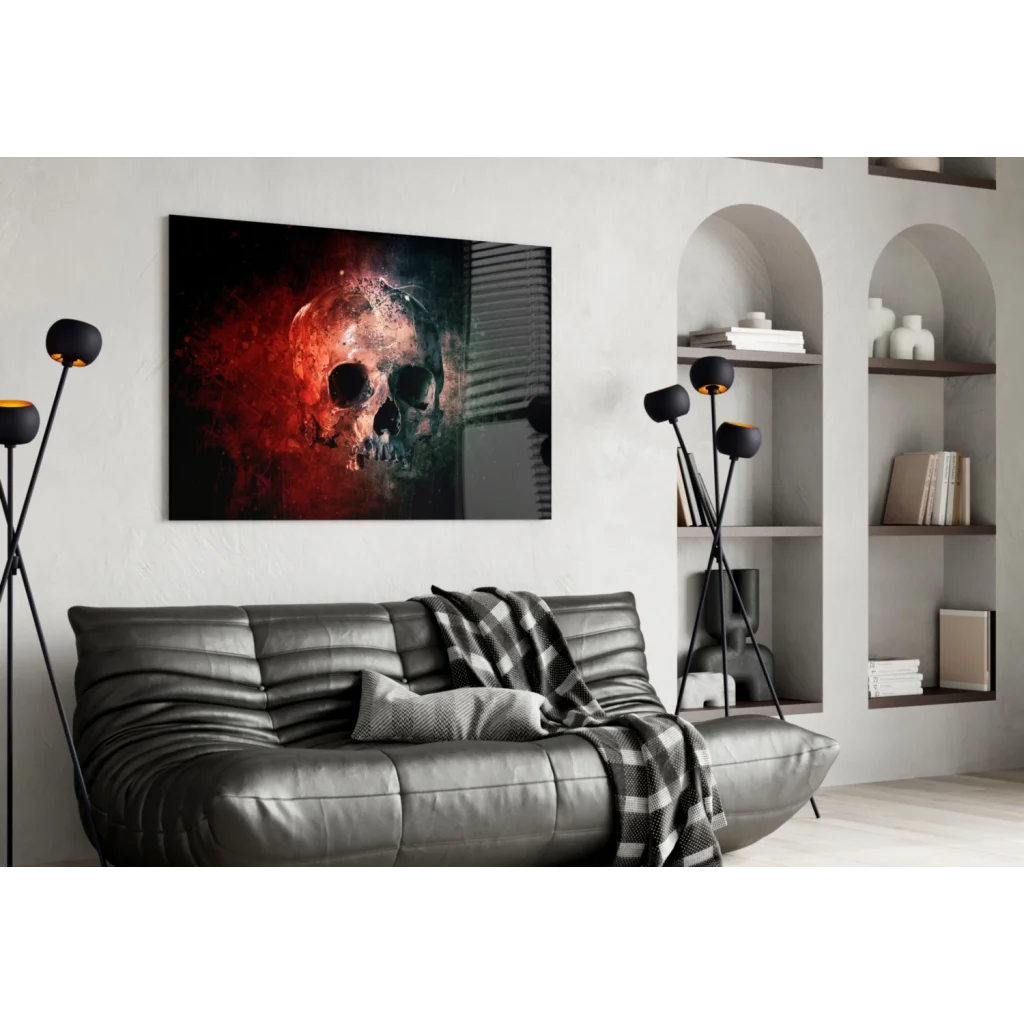 Bold red skull canvas wall art over black leather sofa with checkered throw