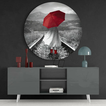 Bold red umbrella woman on tracks in tempered glass art circle