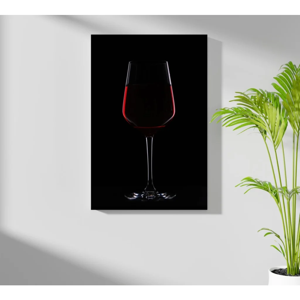 Sleek black canvas print of bold red wine glass on black background