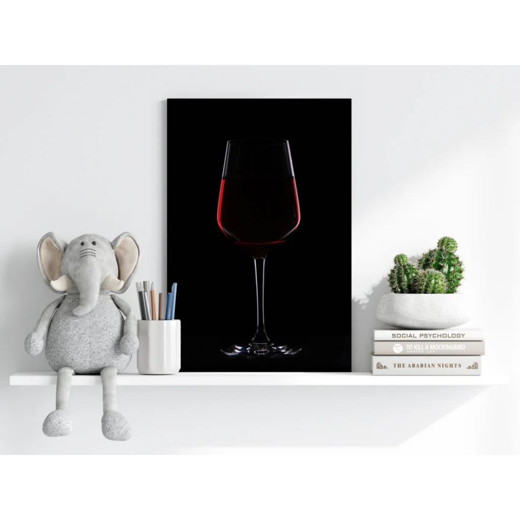 Bold red wine glass on black canvas print