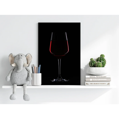 Bold red wine glass on black canvas print