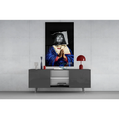 Black and white robed figure in prayer on bold red-accented glass wall art