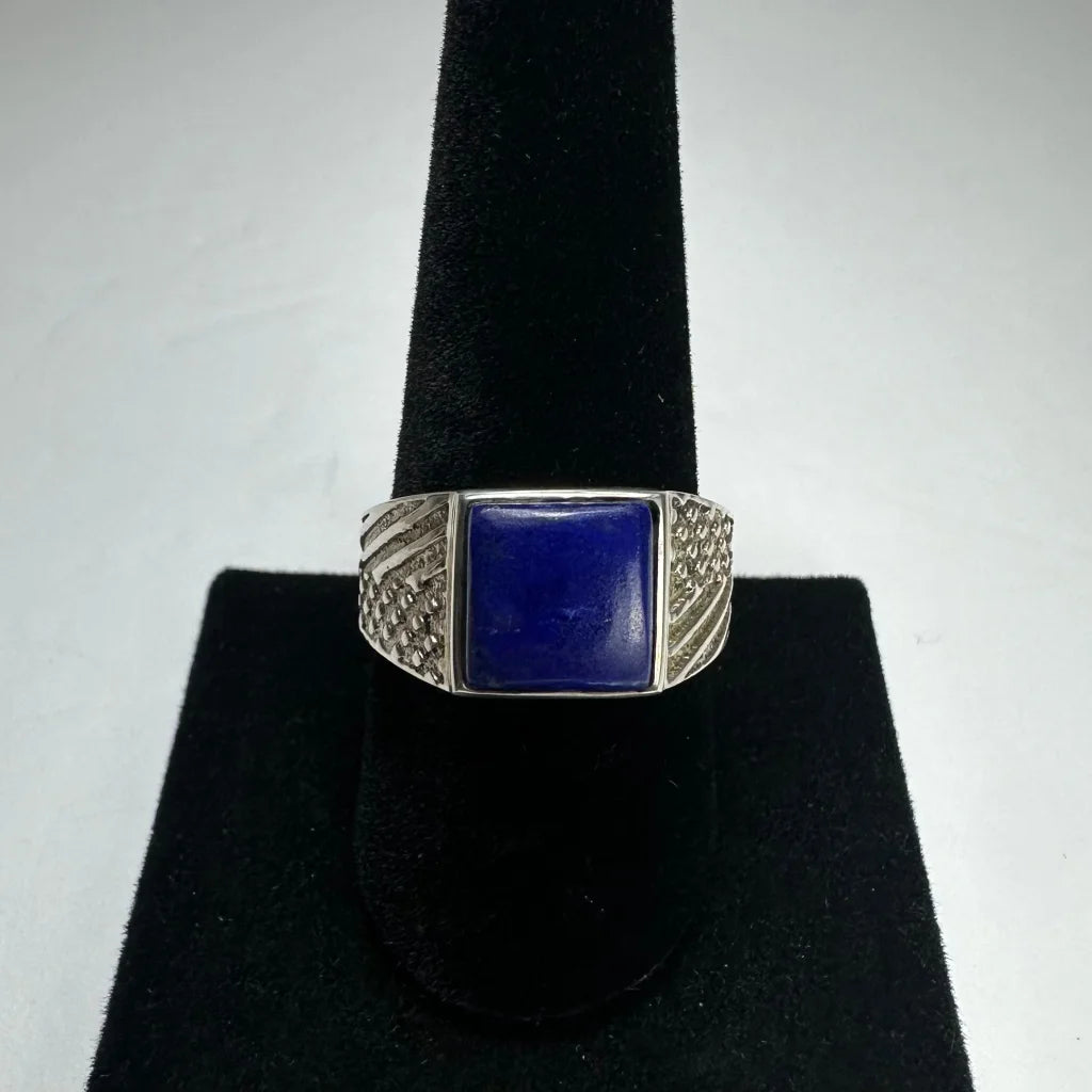 Bold silver lapis lazuli ring with square-cut stone and ornate band