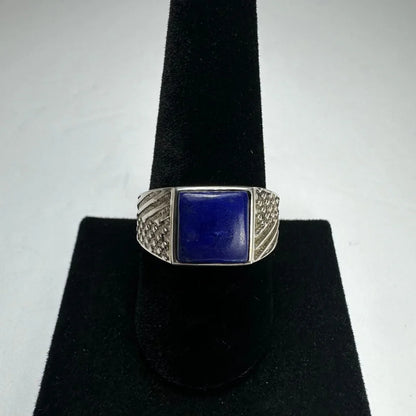 Bold silver lapis lazuli ring with square-cut stone and ornate band