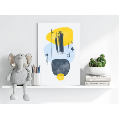 Gray plush elephant toy with floppy ears on white shelf