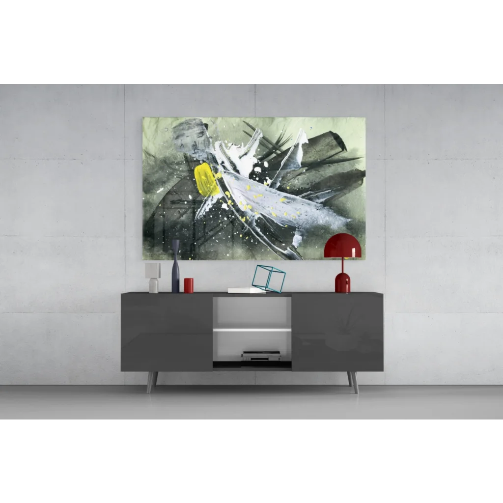 Modern gray lacquered sideboard with silver legs under bold yellow splash wall art