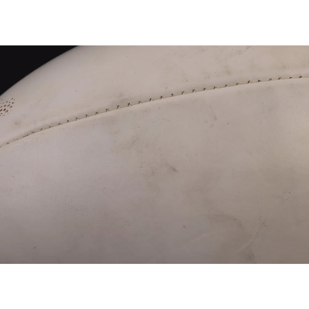 Worn white leather football with visible stitching and Super Bowl XXXVII logo