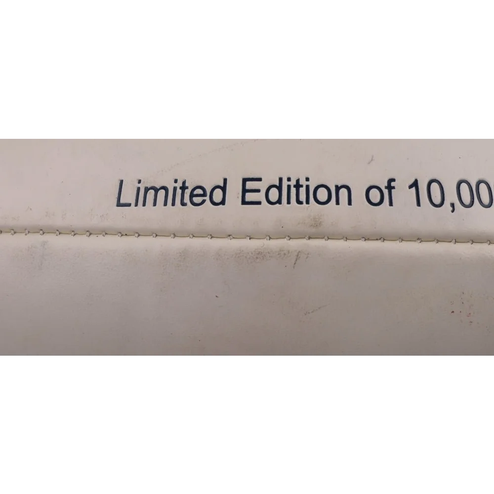 White limited edition Super Bowl XXXVII logo football with bowl XXXVII logo inscription