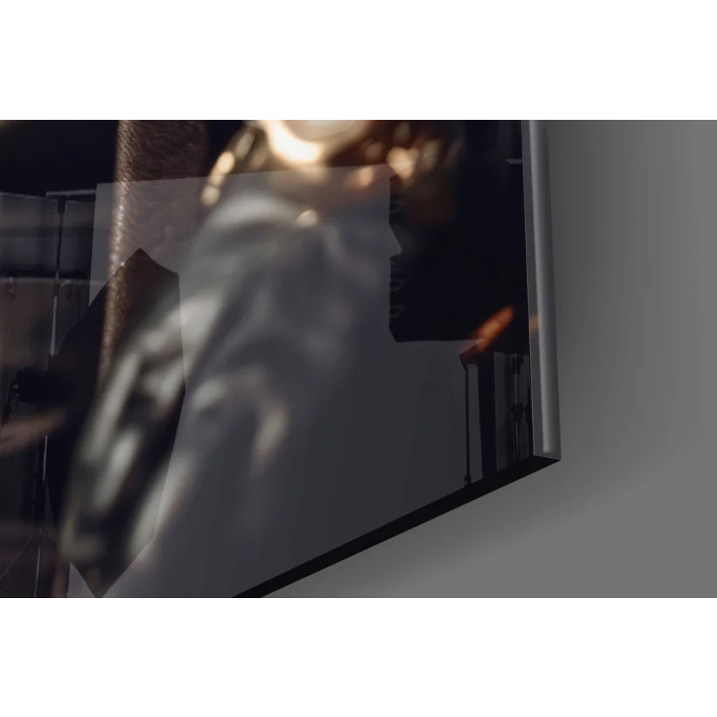 Sleek silver-framed glass wall art mirror with blurred reflections