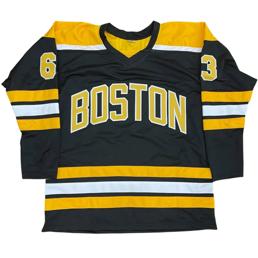 Signed Brad Marchand custom jersey with black gold accents and sleeve numbers 6 3