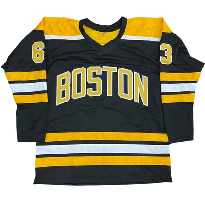 Signed Brad Marchand custom jersey with black gold accents and sleeve numbers 6 3