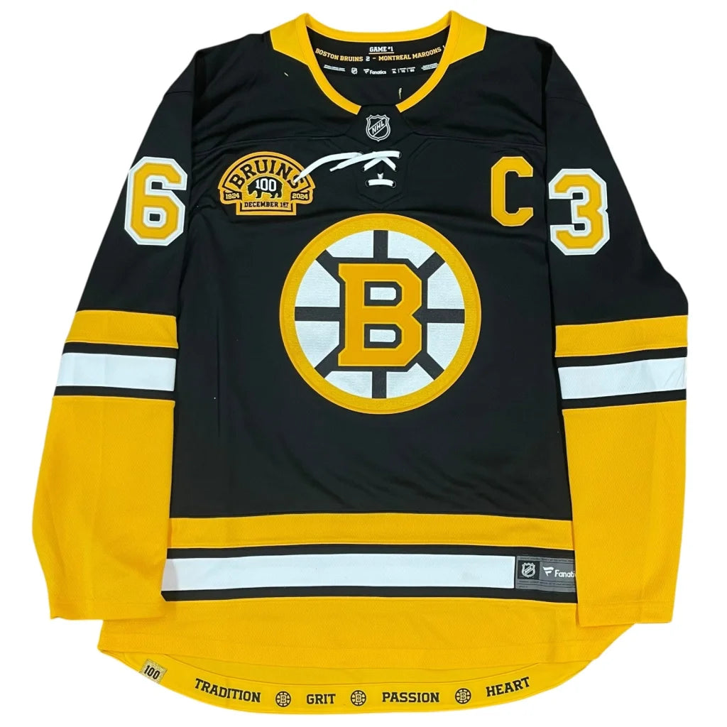 Brad Marchand autographed black Boston Bruins #63 jersey with gold trim