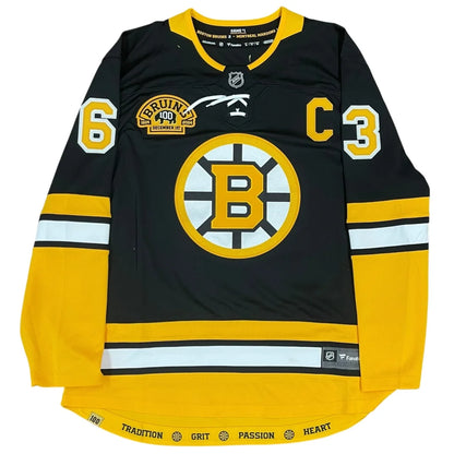 Brad Marchand autographed black Boston Bruins #63 jersey with gold trim