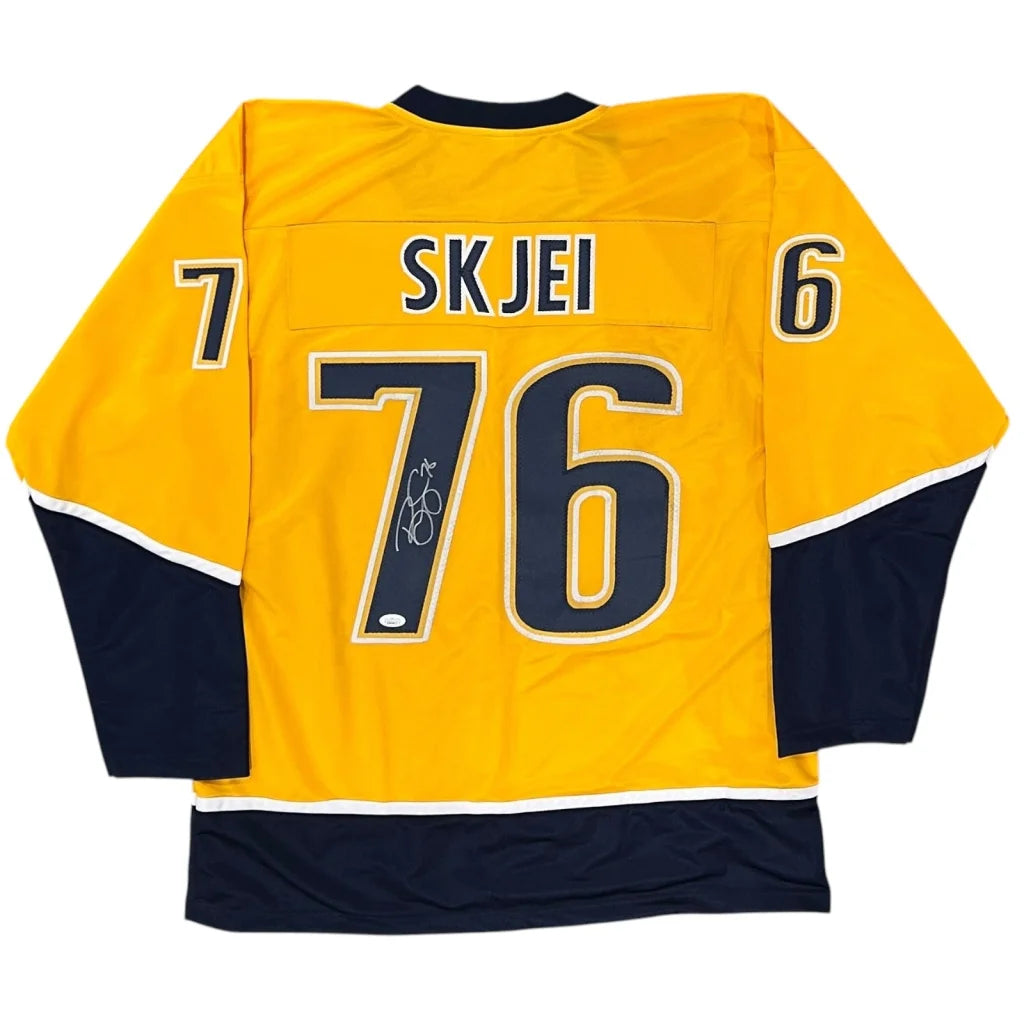 Brady Skjei autographed custom hockey jersey, yellow and navy blue with name Skjei and number 76