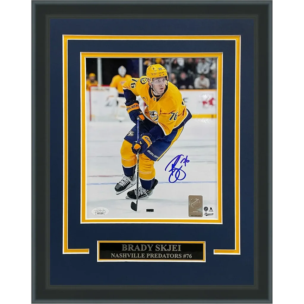 Framed 8x10 photo of autographed Brady Skjei Nashville Predators gold jersey