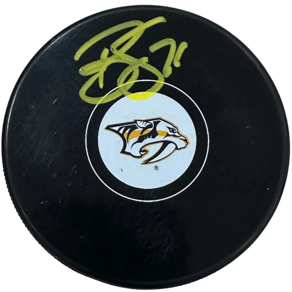 Signed Brady Skjei Nashville Predators hockey puck with holo sticker