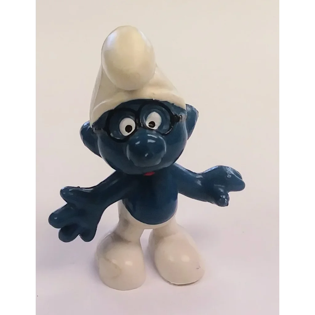 Brainy Smurf collectible figurine in white hat and blue body